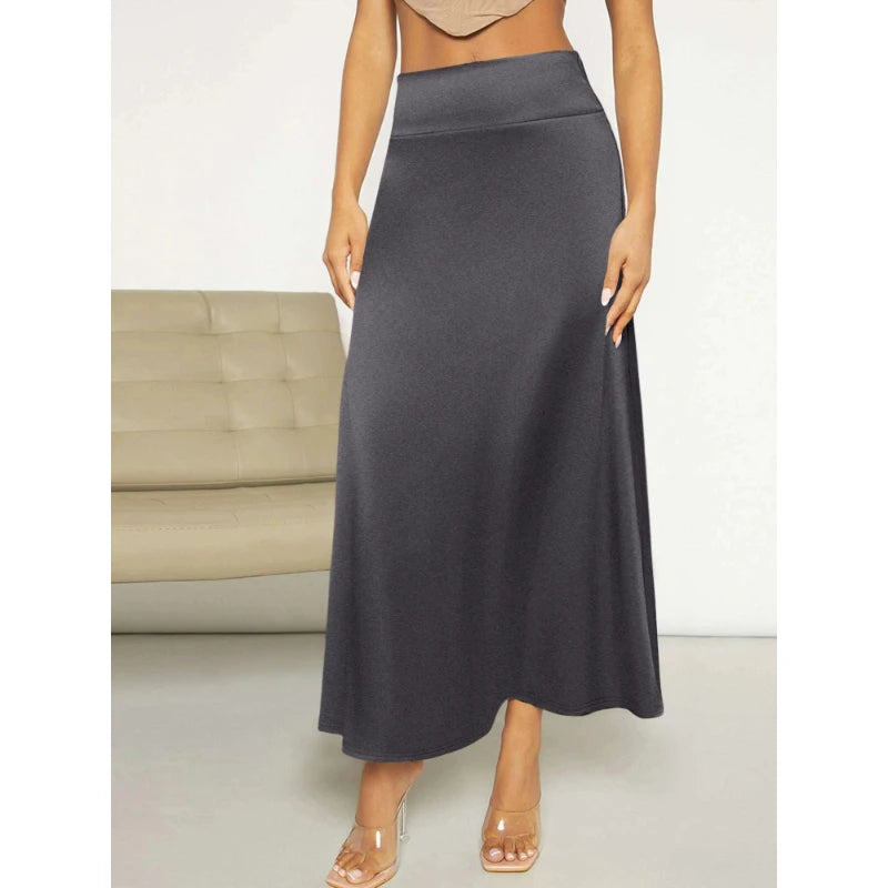 Jupe longue de couleur unie pour femmes, tempérament élégant, adaptée aux fêtes de vacances, tissus tricotés confortables en soie de lait
